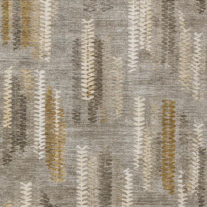 Close-up gray and pewter abstract rug with white, tan, and gold zigzag motifs