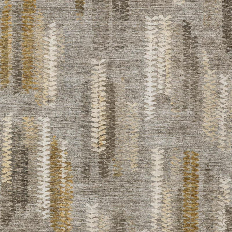 Close-up abstract rug texture in gray and pewter with white zigzag and touches of gold