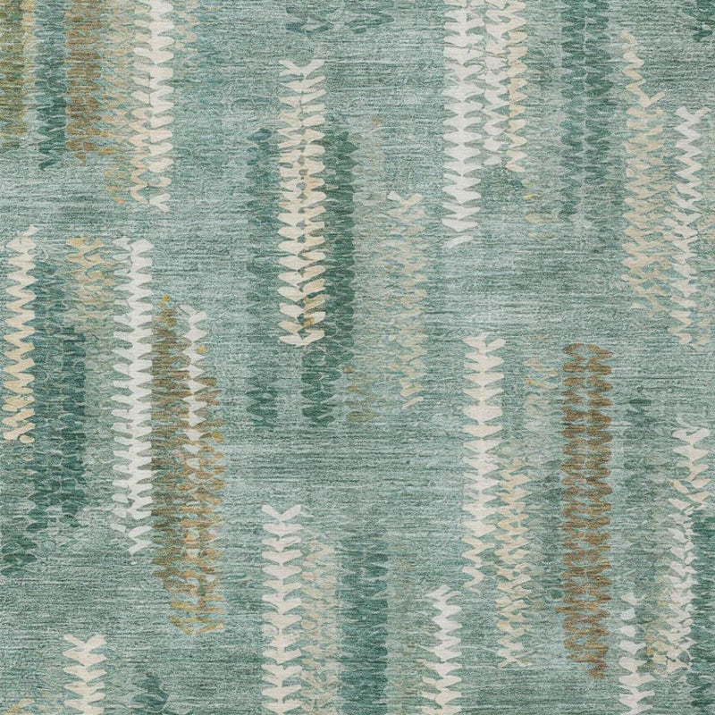 Close-up abstract area rug texture with aqua teal pattern and off-white chevrons