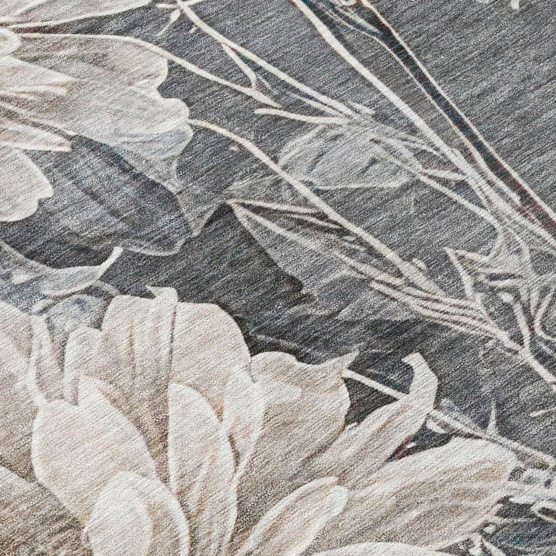 Gray area rug with silver floral and vine motif, textured woven look