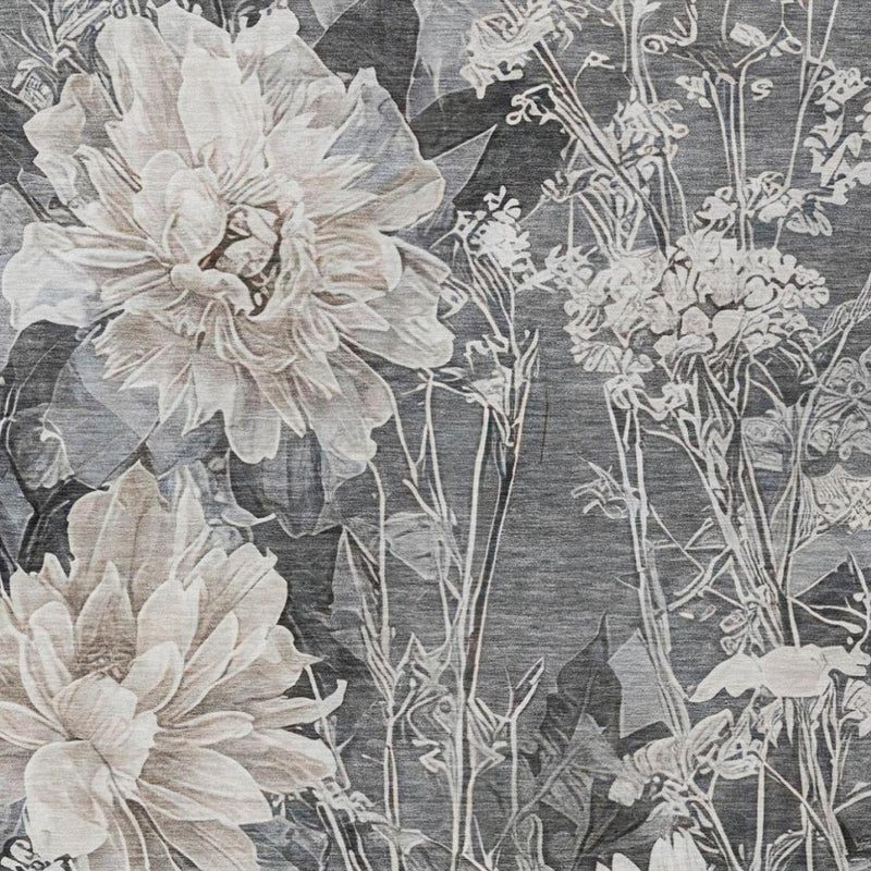 Close-up of gray area rug with large light floral blossoms and fine stems