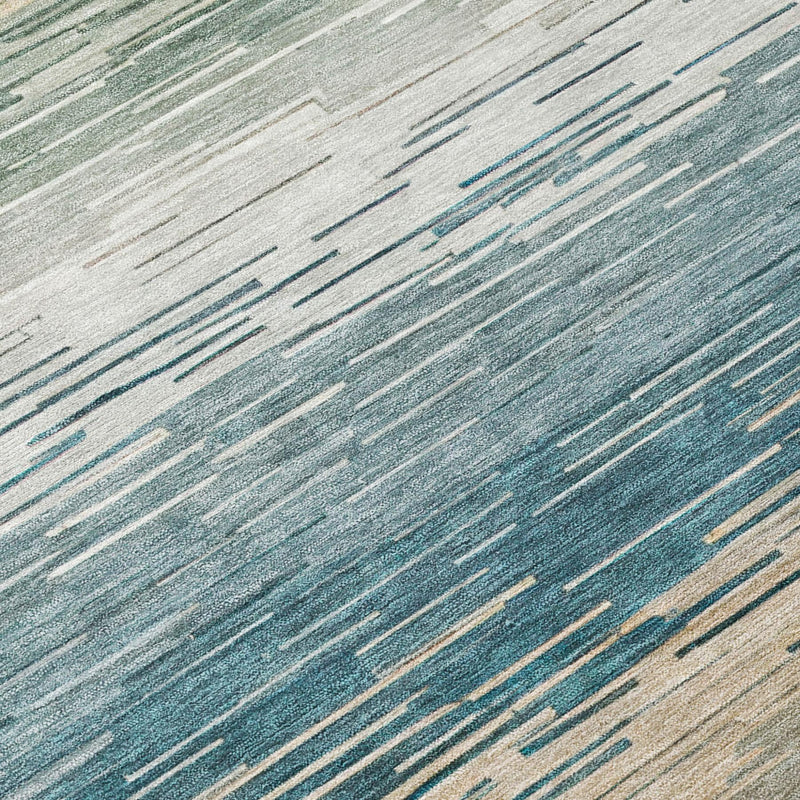 Close-up of teal blue and silver abstract horizontal stripes with distressed texture