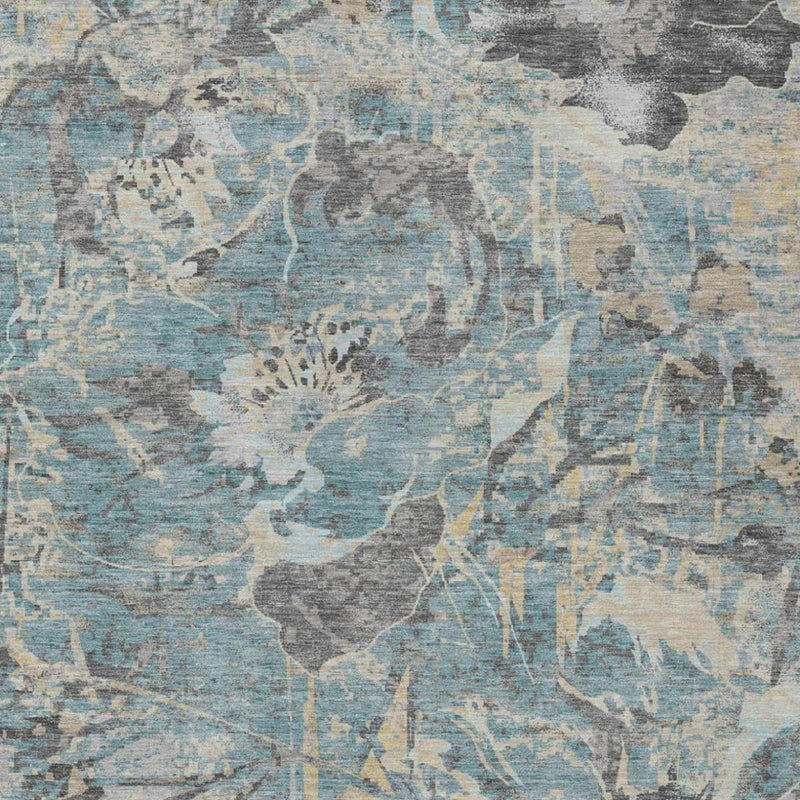 Teal and silver floral area rug close-up of abstract botanical motifs