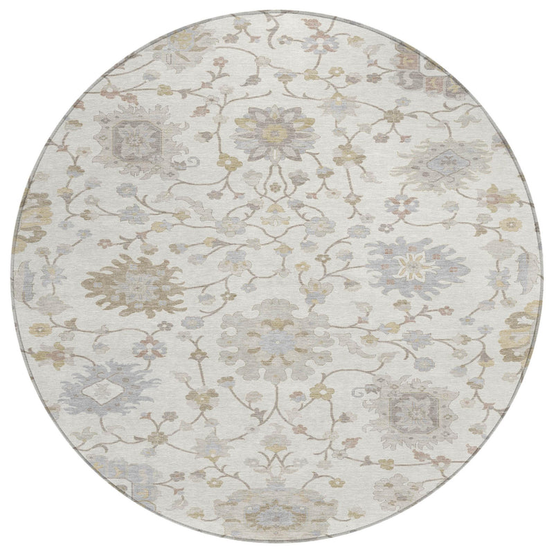 Round ivory floral area rug with scrolling vine pattern and subtle colored accents