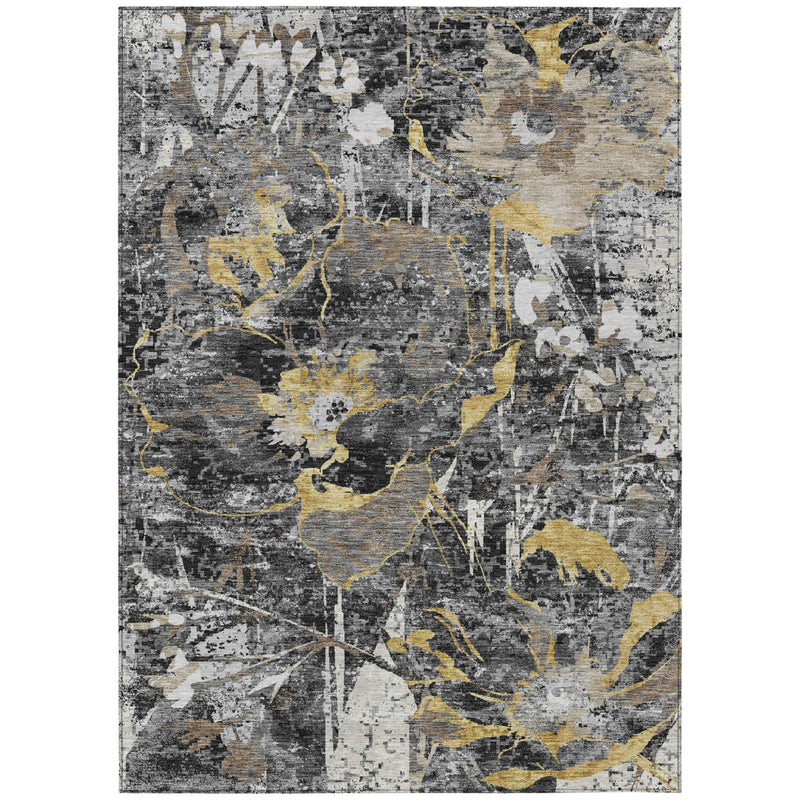 Rectangular black, gray, and ivory area rug with gold floral motifs