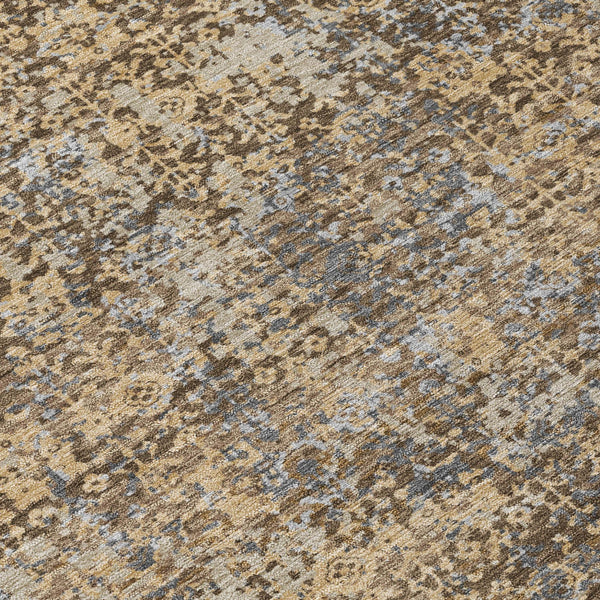 Abstract area rug with beige, brown, and dark teal distressed pattern