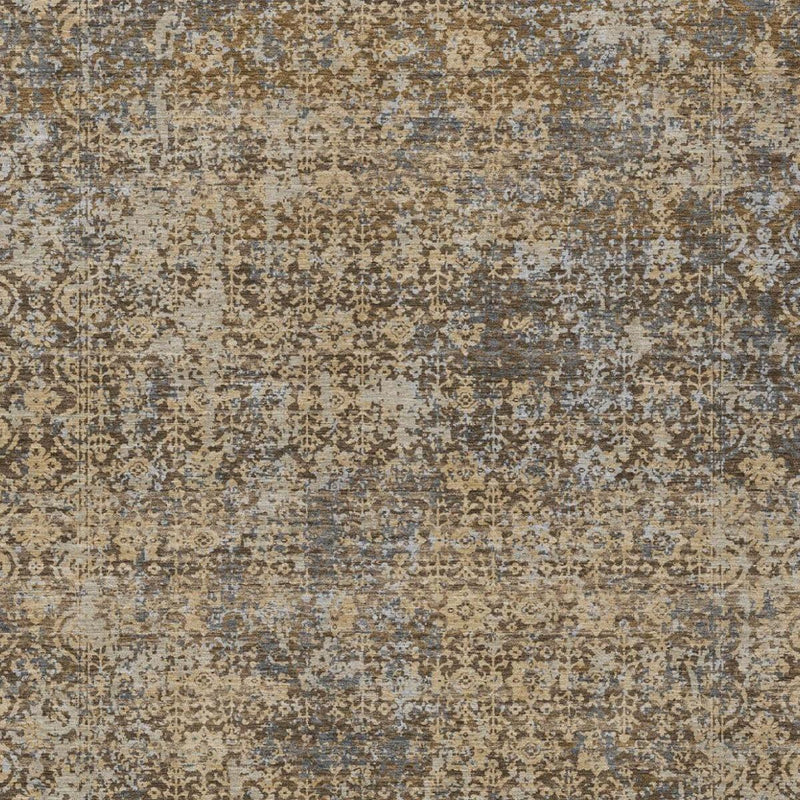 Textured abstract area rug with beige, brown, and muted blue fleck pattern
