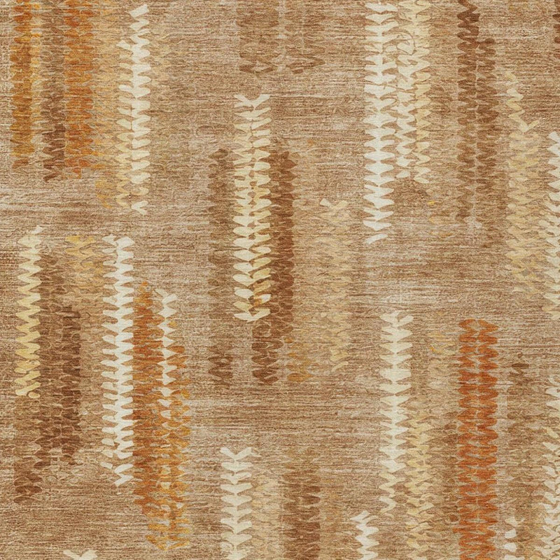 Close-up of tan rug with vertical tribal stripes in white, copper, and orange