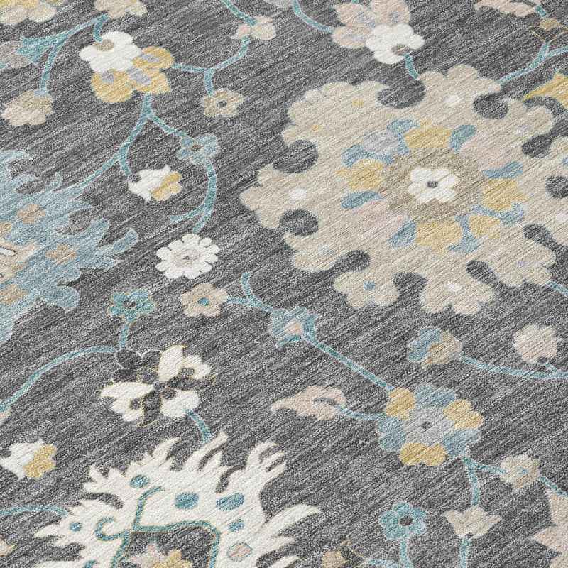 Textured gray rug with clustered flowers and vines in light blue, cream, and yellow