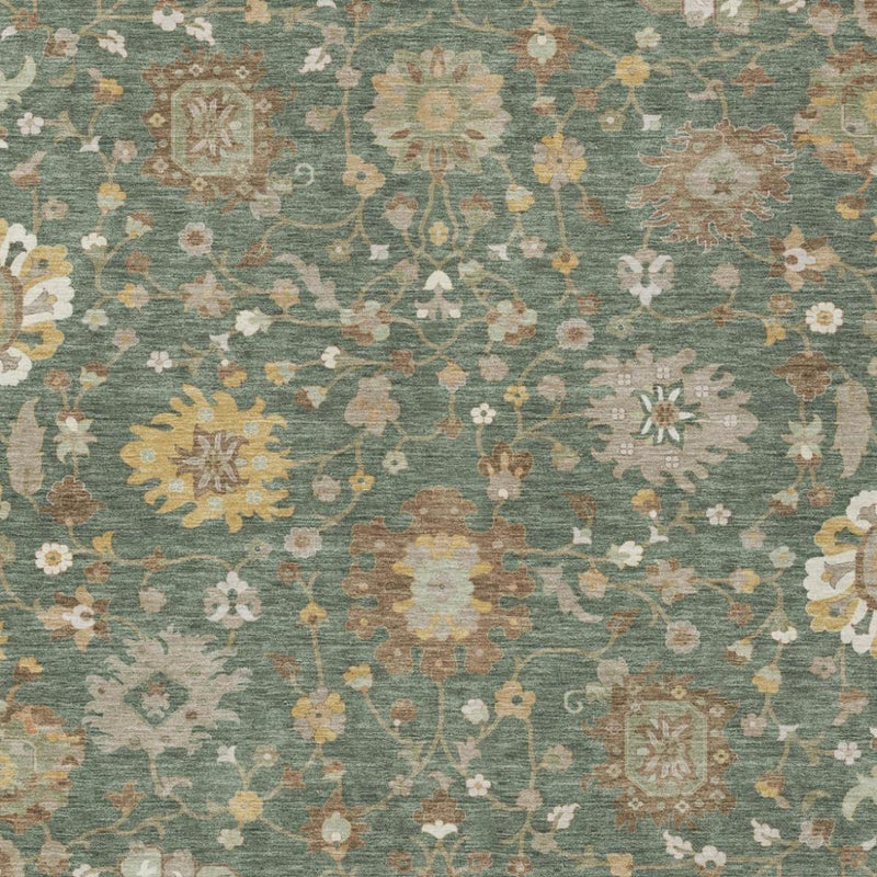 Close-up of teal area rug with beige floral and medallion design