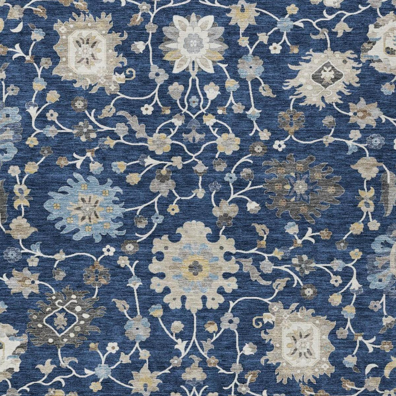 Navy blue floral area rug close-up with beige star and flower motifs