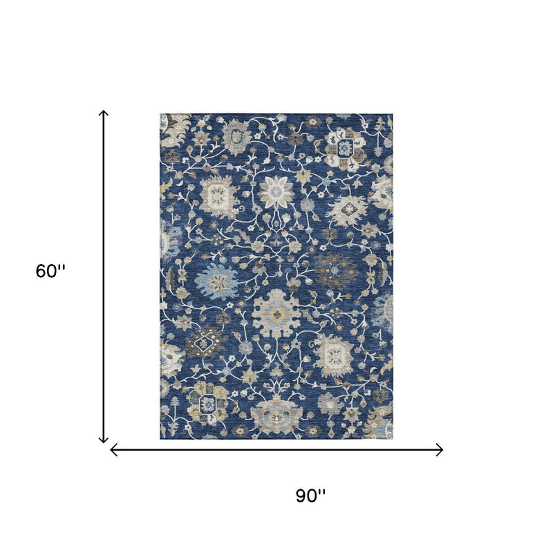 Navy blue floral area rug, 90 x 60 in, with beige and white scrolling pattern