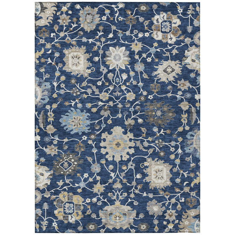 Full view navy floral area rug with dense scrolling blossoms in cream and gold
