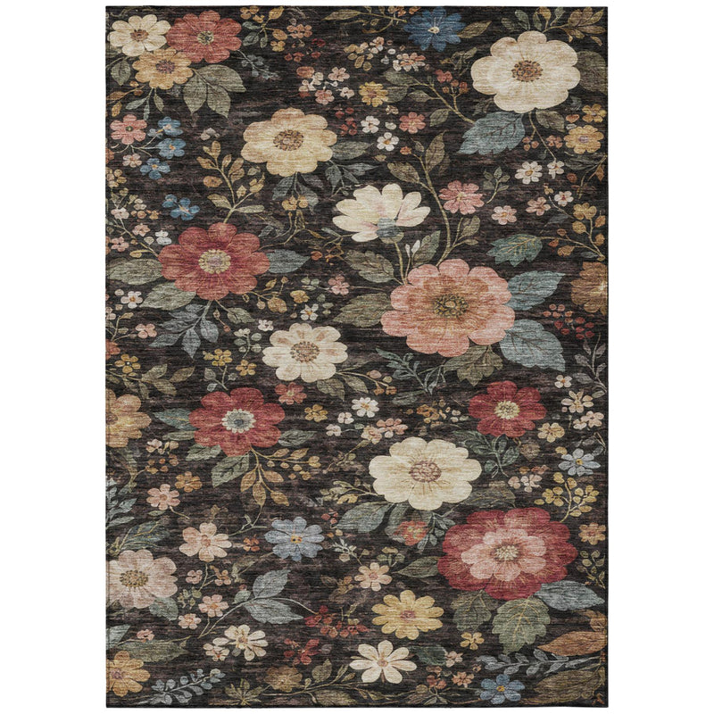 Rectangular floral area rug in dark charcoal with cream, coral, and blue flowers.