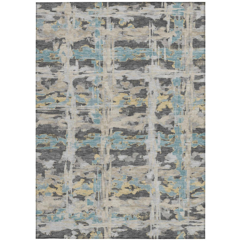Abstract rectangular area rug in gray, cream, and light blue with textured blocks