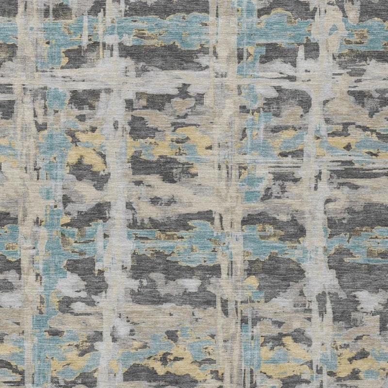 Detailed view of gray and light blue abstract rug with faded geometric blocks