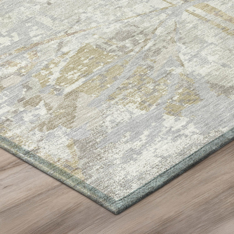 Ivory and silver area rug corner view with abstract floral texture and border.