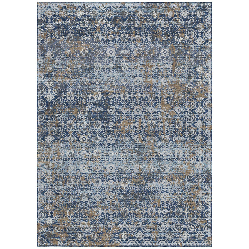 Navy and blue abstract area rug featuring scattered medallion and grid-like distress