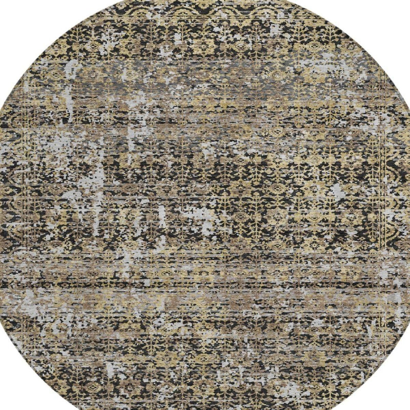 Round abstract rug with cream-and-beige base, dark speckle, and distressed lines