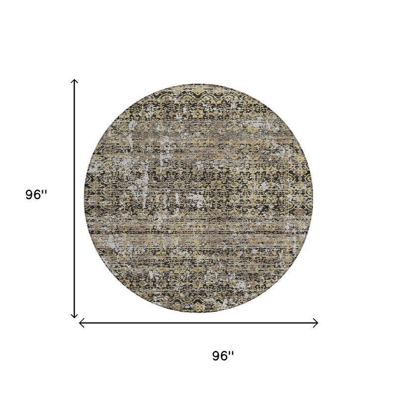 96 in round abstract rug with speckled pattern in black, gray, and cream