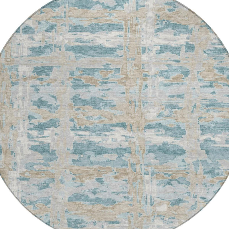 Centered view of round rug with light blue and beige abstract texture and vertical stripe motif