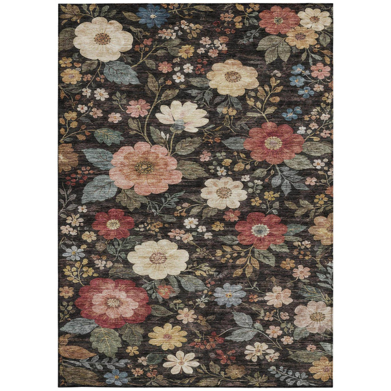 Rectangular floral area rug in black and charcoal with cream, red, and blue flowers.