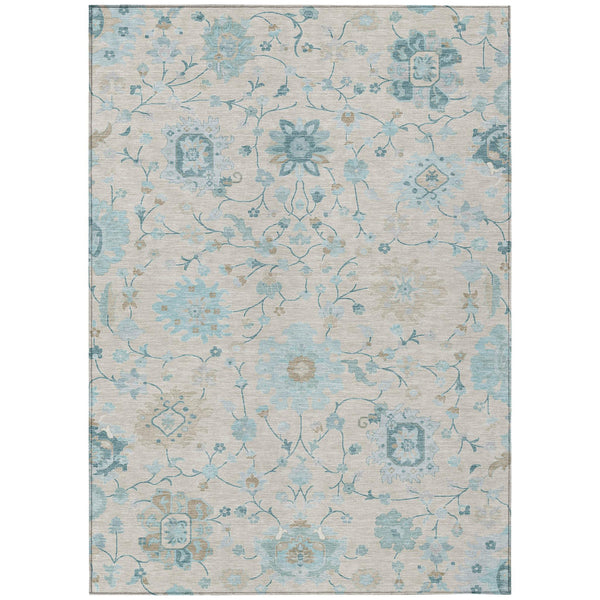 Light blue and ivory floral area rug with distressed medallion and vine pattern