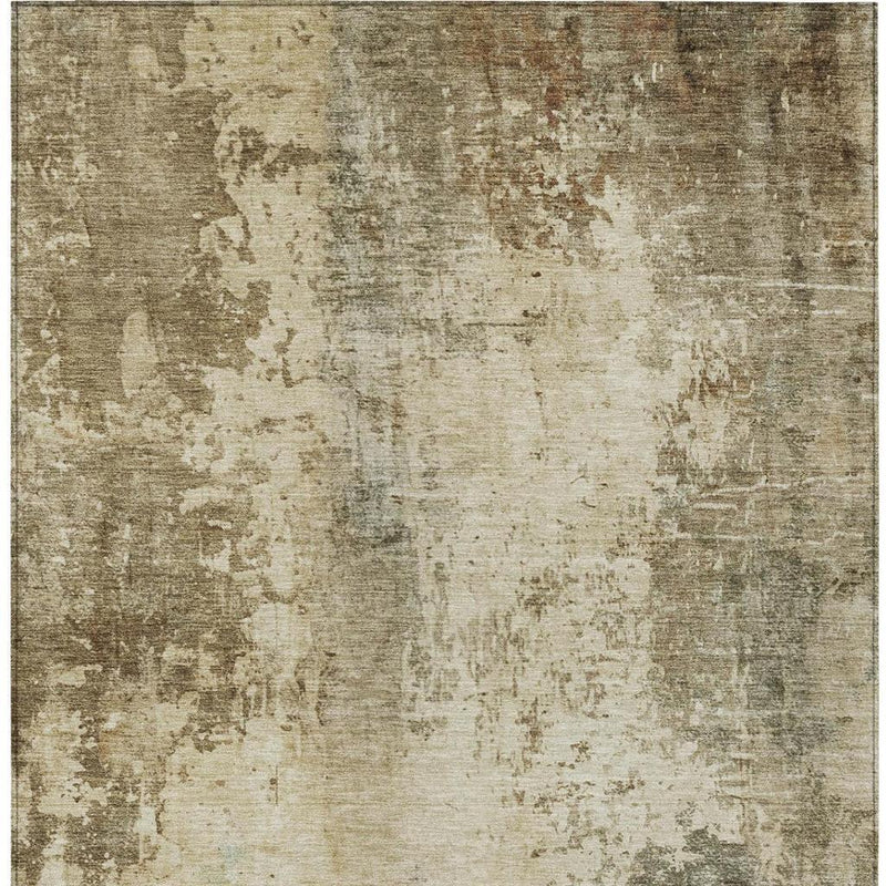 Beige, gray, and olive abstract distressed area rug with worn print, rectangular
