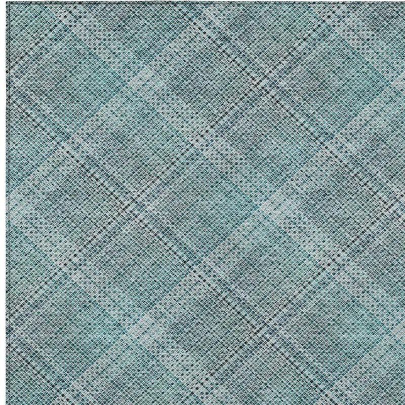 Teal blue and silver plaid area rug with subtle distressed diamond square pattern