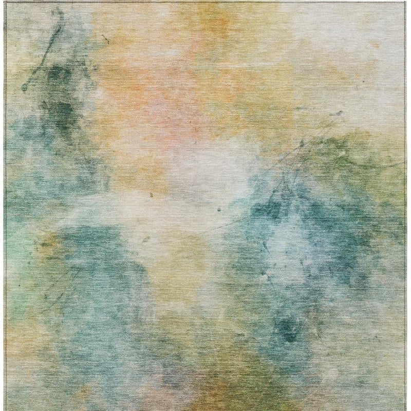 Abstract area rug pattern with soft teal blue and peach wash, scattered distressed specks