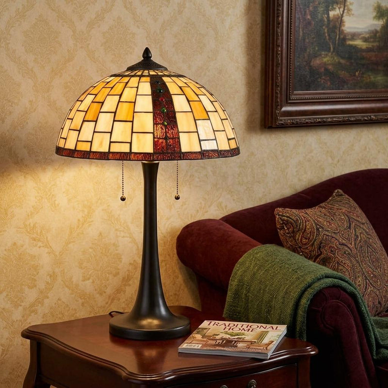 Bronze table lamp with stained-glass dome shade, amber mosaic with red vertical strip