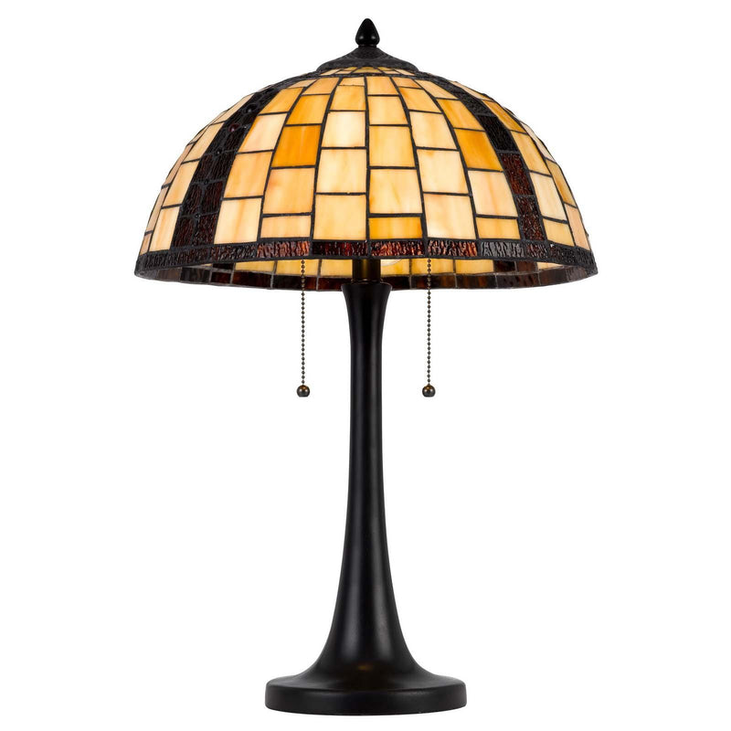 Round stained-glass dome lamp shade with amber and white mosaic over dark bronze base