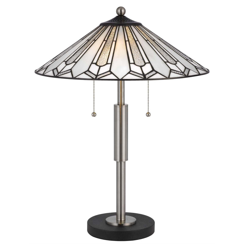 Slim table lamp silhouette with Tiffany-style stained glass shade and brushed metal pole