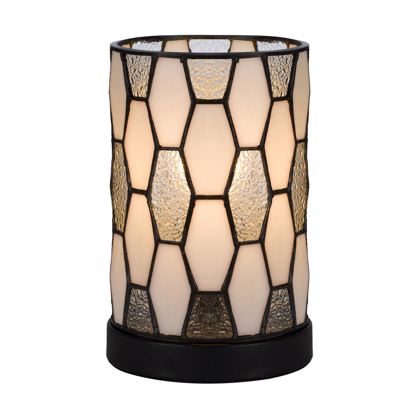 Bronze abstract cylinder lamp shade with geometric stained-glass panels and dark base