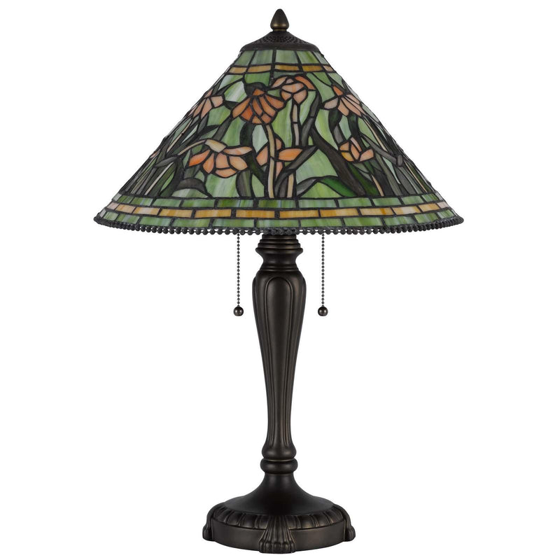 Bronze Tiffany-style stained-glass dome lamp featuring green leaves and orange flowers