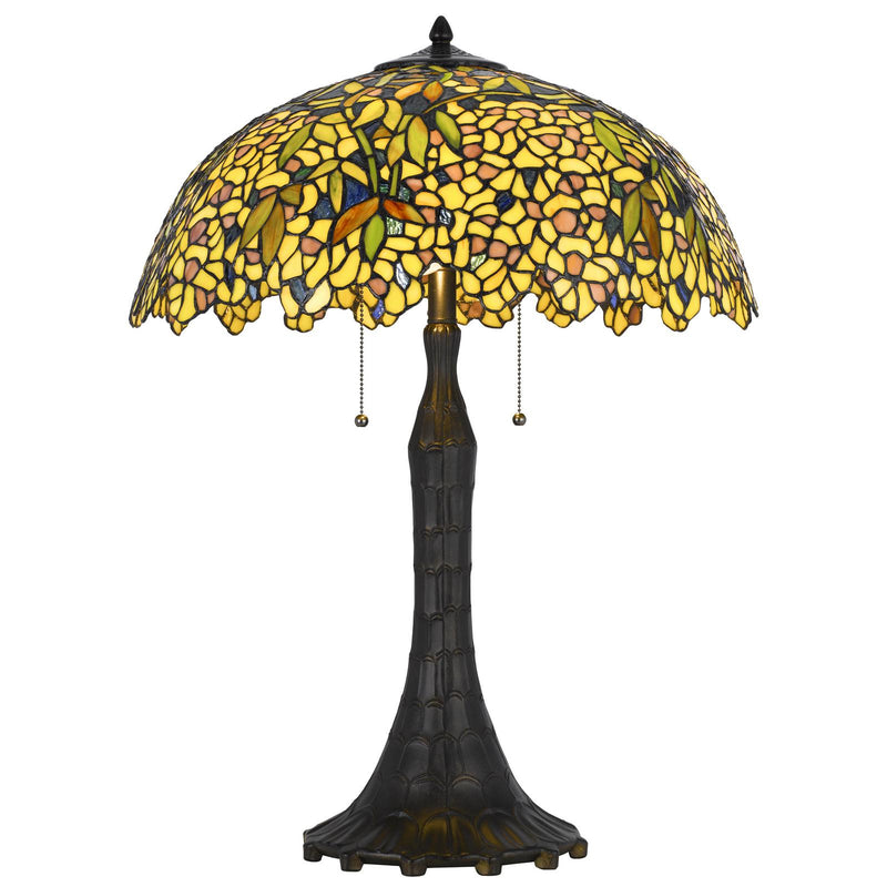 Table lamp with yellow-green stained glass dome shade, pull chains, and dark bronze base