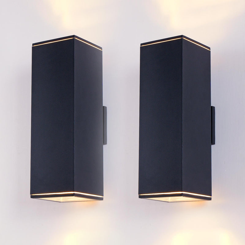 Pair of black outdoor wall lantern lights with warm LED glow and angular frame