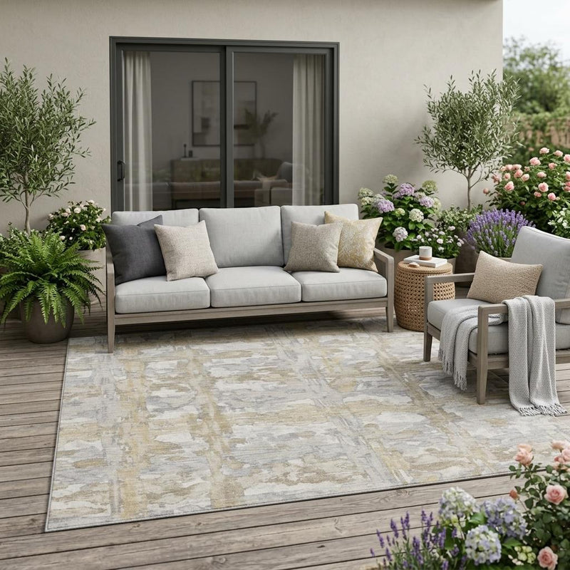 Indoor outdoor area rug in ivory and silver abstract distressed pattern