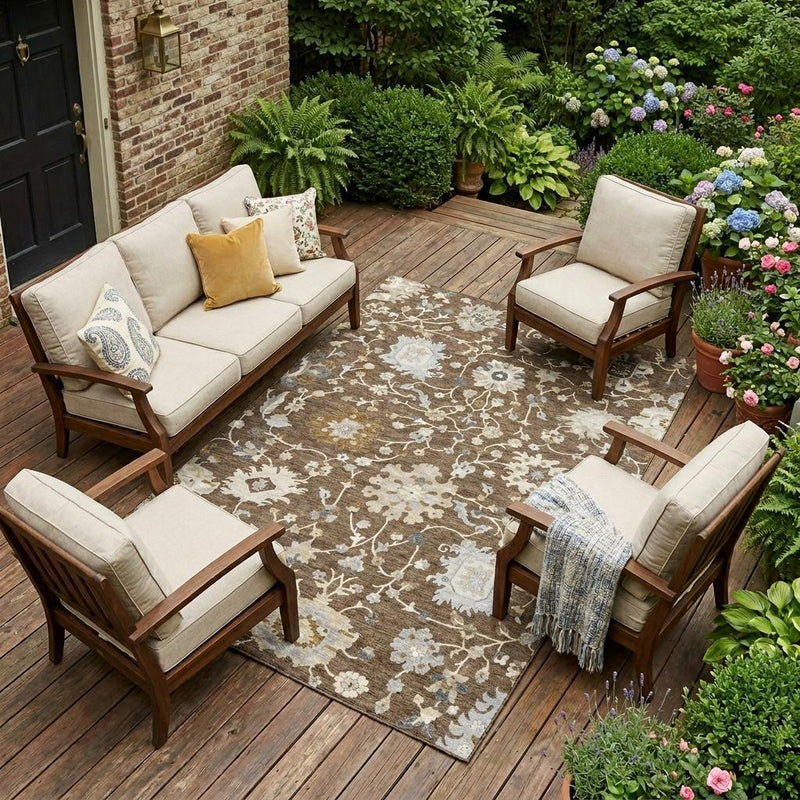 Brown floral area rug with cream and light blue flowers in an outdoor seating area