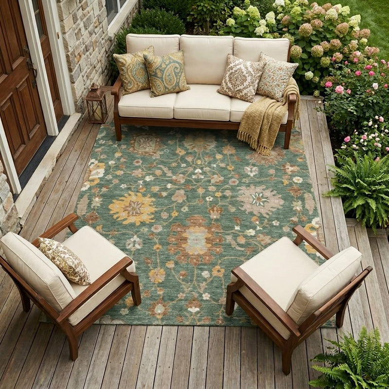 Teal floral area rug on outdoor wooden deck