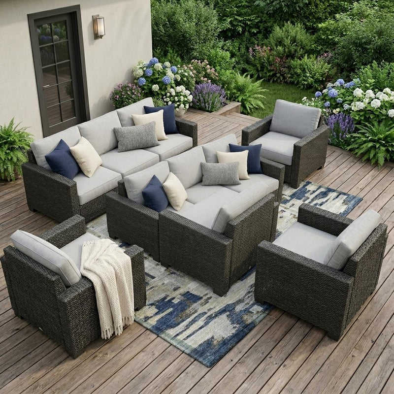 Navy-blue abstract outdoor area rug on wooden patio with distressed design