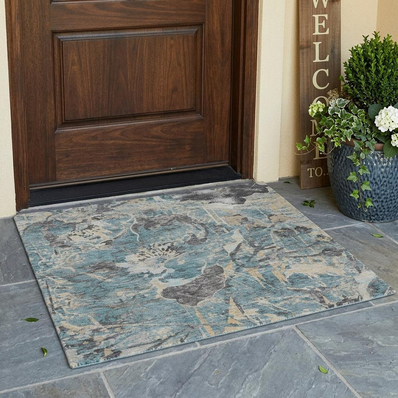 Teal blue floral area rug with gray and silver abstract print, rectangular