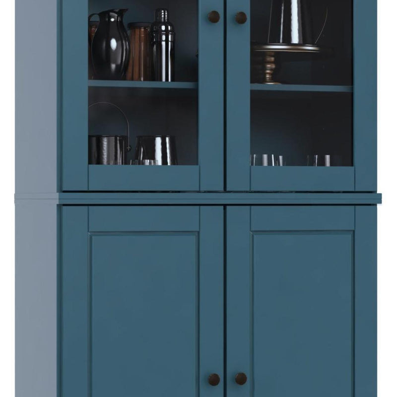 Teal blue wood cabinet with round knobs on lower doors and glass shelves above