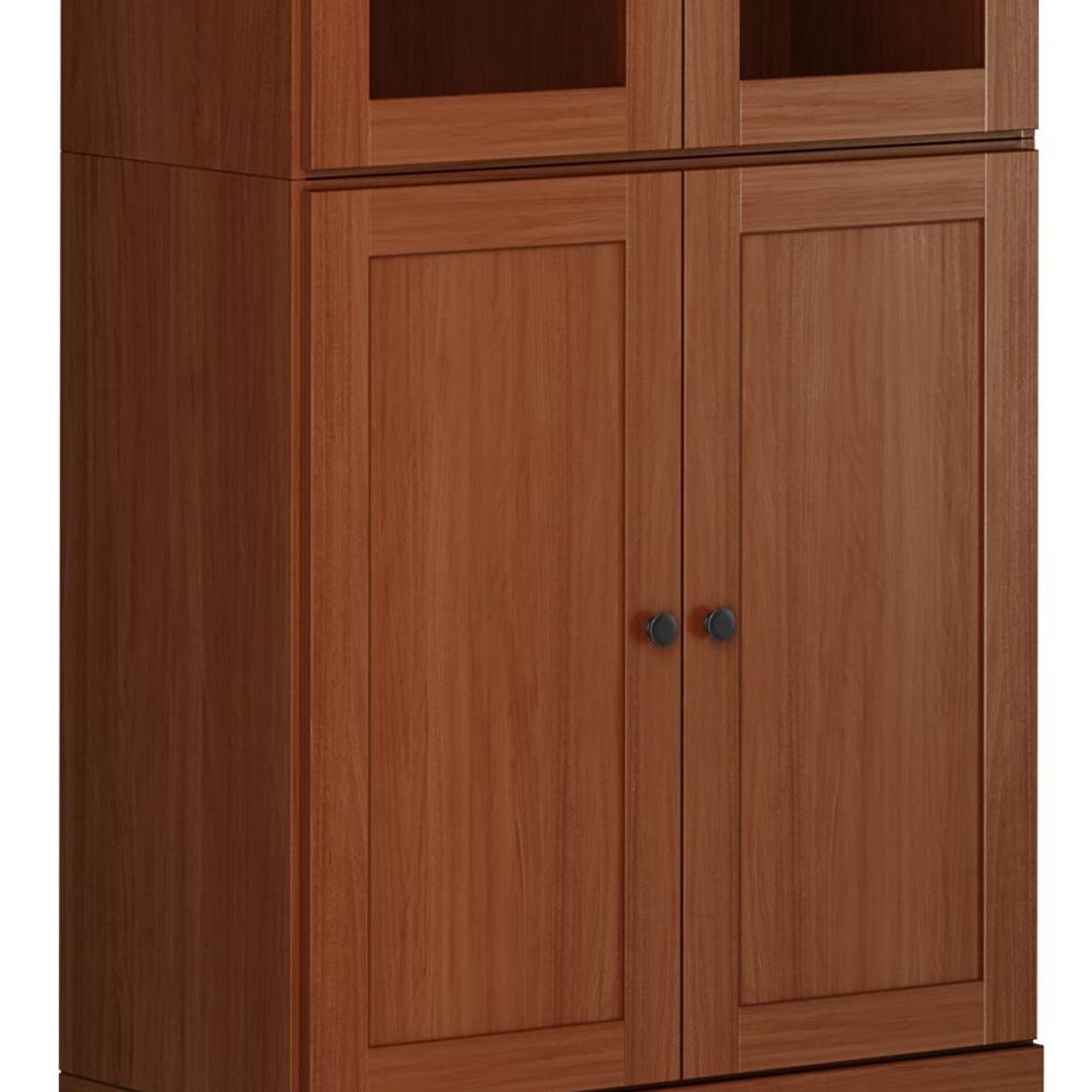 Wood pantry cabinet lower doors with two round knobs