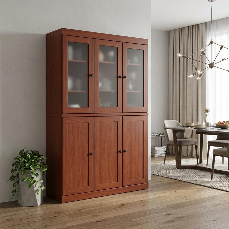 Brown wood storage cabinet with three glass-front upper doors and three lower paneled doors
