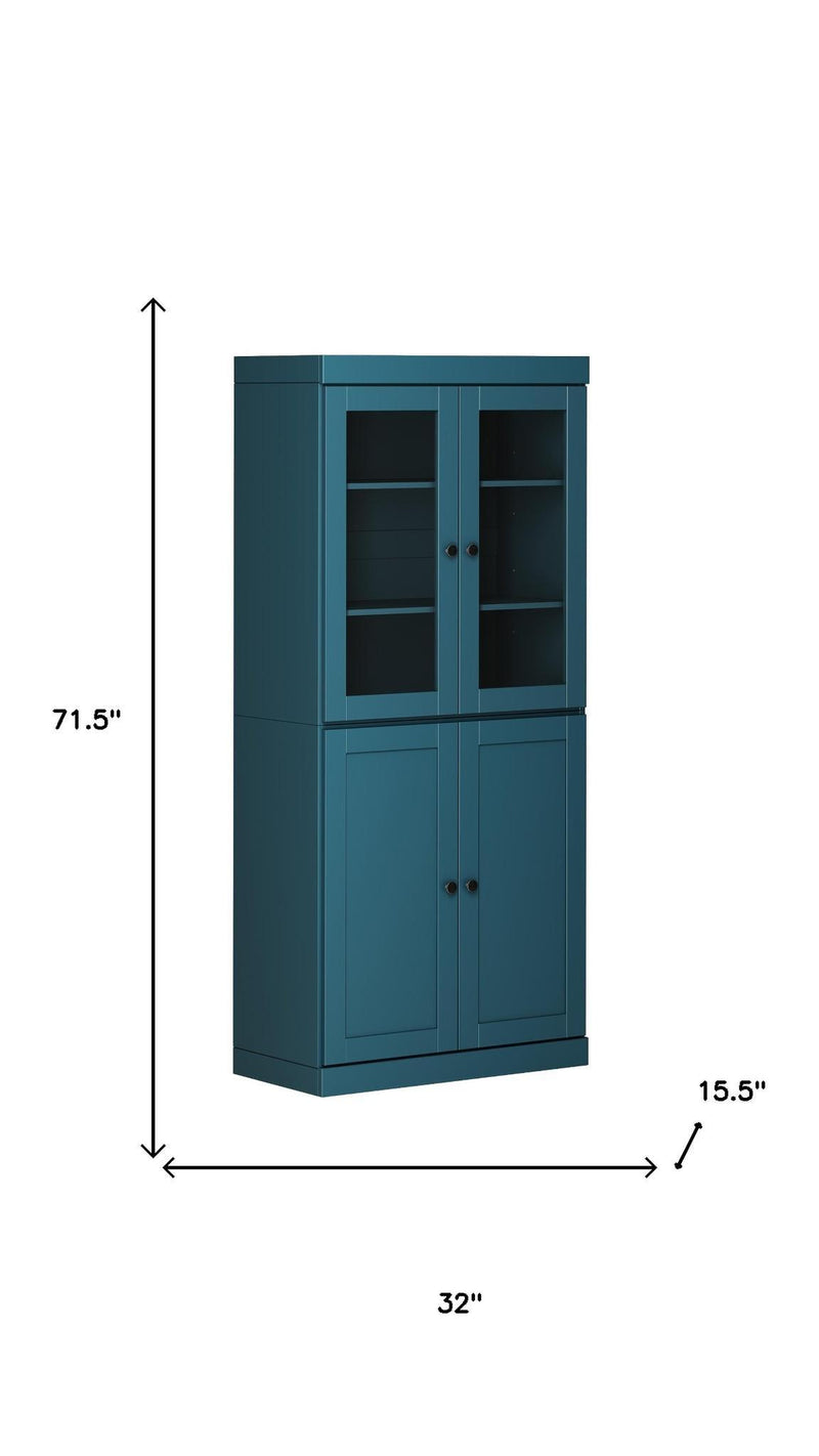 Tall teal blue storage closet with double glass doors above and double panel doors below