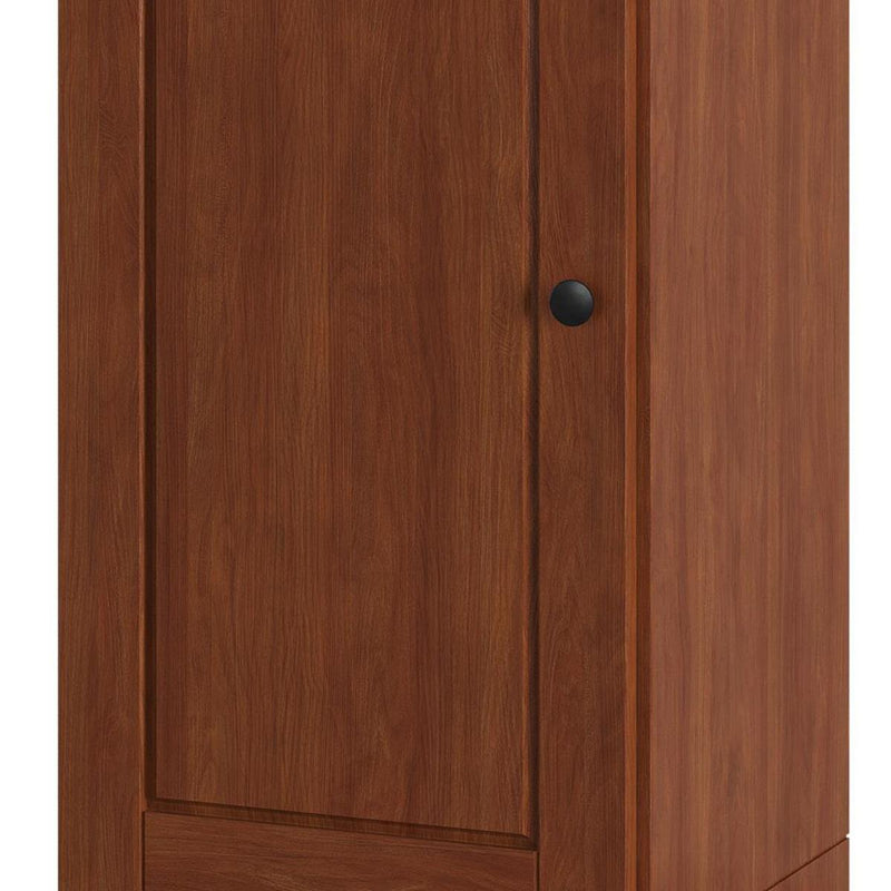 Wood shoe cabinet door close-up with round black knob and recessed panel