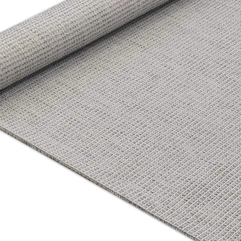 Gray woven area rug with rolled edge and textured surface