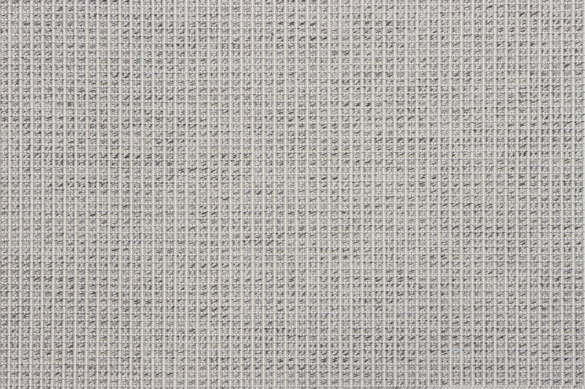 Gray woven area rug surface close-up with tight grid pattern