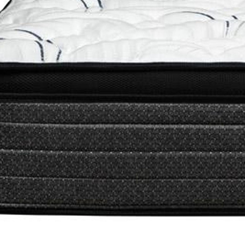Plush euro-top hybrid mattress side view with black textured layers and white cover.